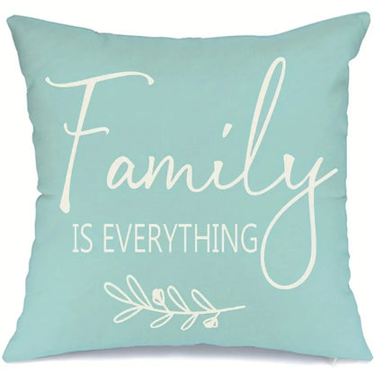 Light blue home decor cushion cover set with Family is Everything white text and leaf design
