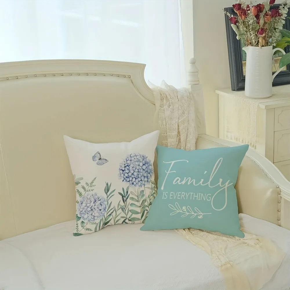 Nutshell home decor cushion cover set with floral and family theme on white sofa