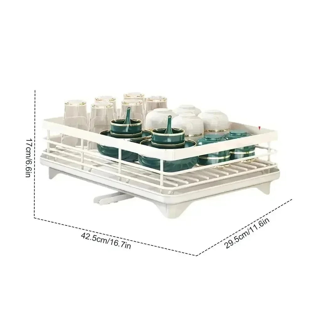 Nutshell white adjustable dish drying rack holding cups bowls and utensils shown with dimensions
