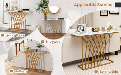 Nutshell modern gold console table with white marble top shown in living room entryway hallway behind sofa