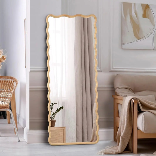 Nutshell rectangular wooden frame mirror with scalloped edges full length leaning mirror in neutral living room