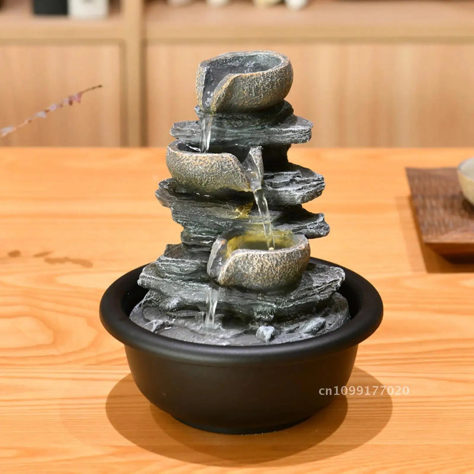 Nutshell indoor tabletop water fountain with cascading stone bowls on black base