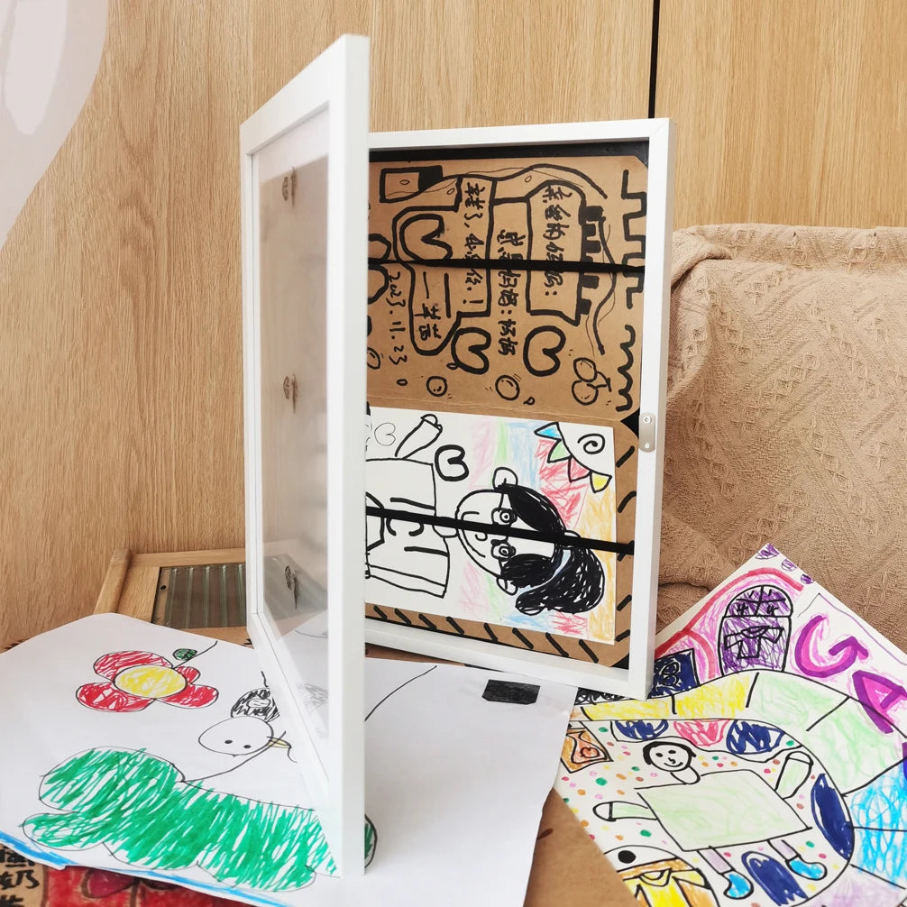 Kids art frames with magnetic front displaying colorful children's drawings and artwork