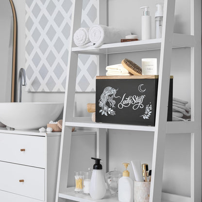 Nutshell lady stuff storage container on a bathroom shelf with towels and toiletries