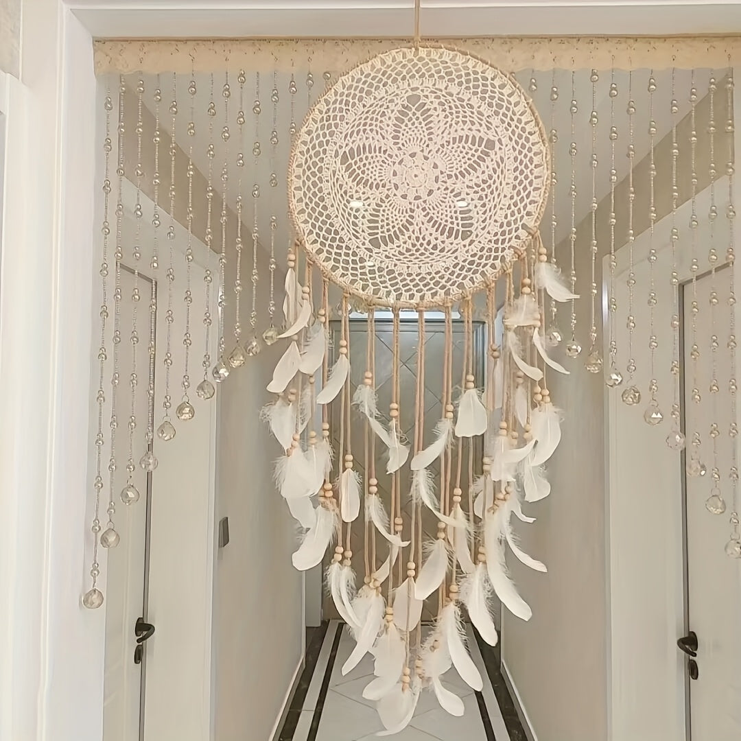 Large boho chic dreamcatcher with intricate lace and feather details, enhancing home decor style