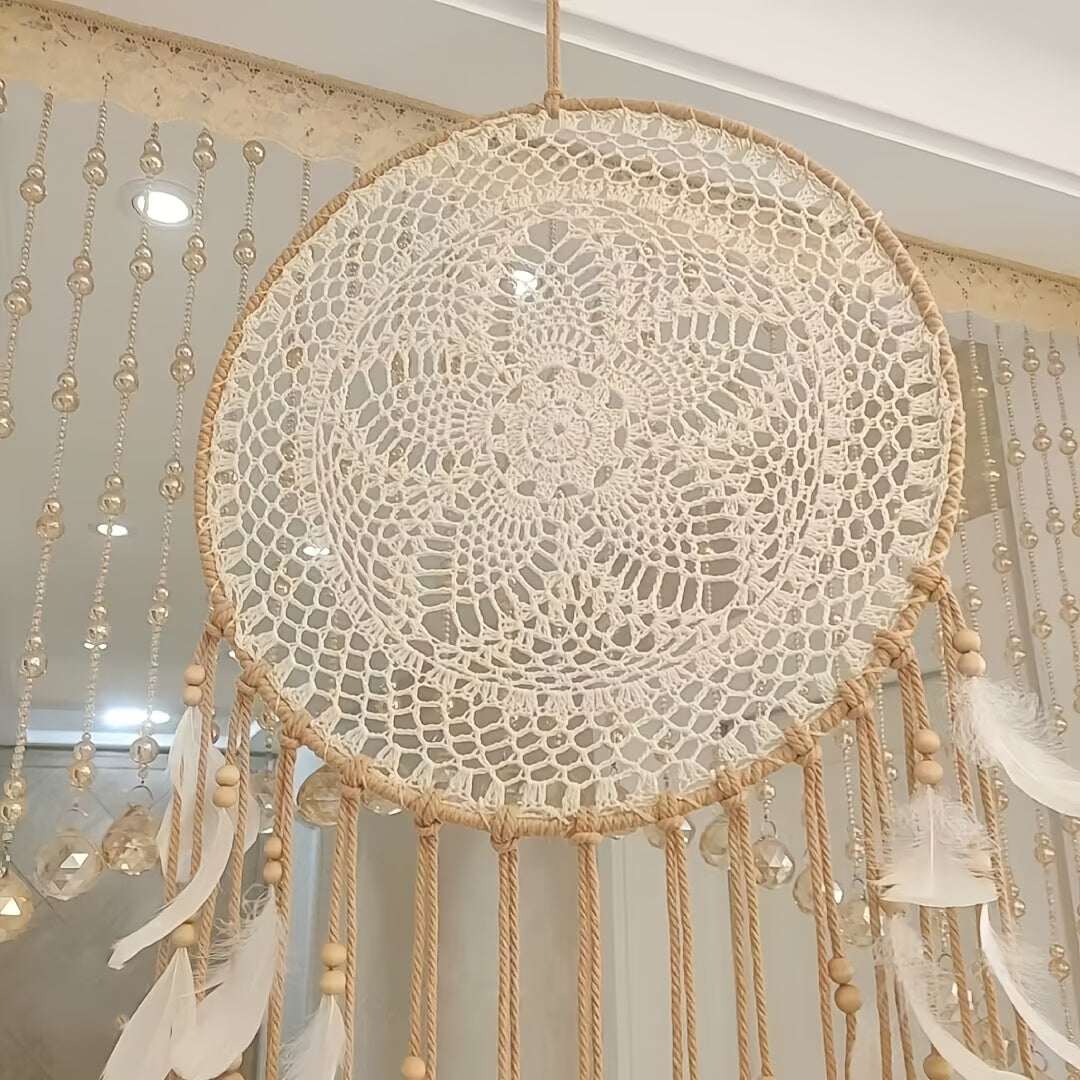 Large boho chic dreamcatcher with intricate crochet design and flowing feathers for home decor