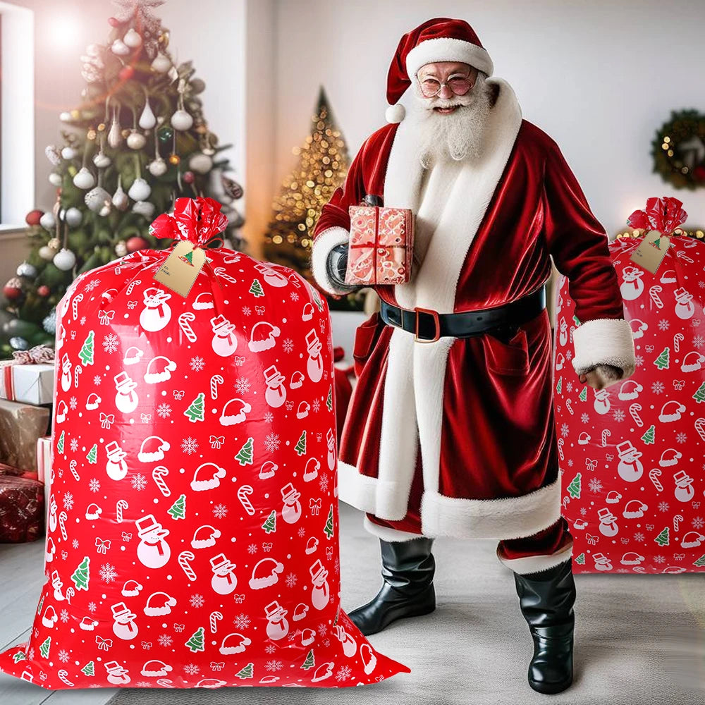 Large Christmas gift bag in festive red with white holiday designs next to Santa Claus holding a present