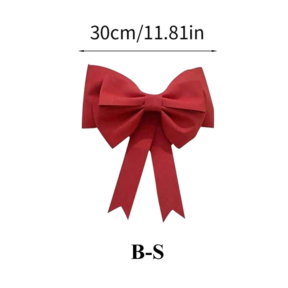 Large red bow measuring 30cm with a classic design for festive decorations