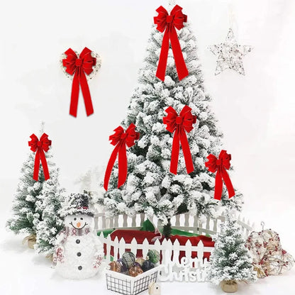 Large Red Christmas Bows Outdoor displayed on snowy Christmas trees for festive holiday decorating