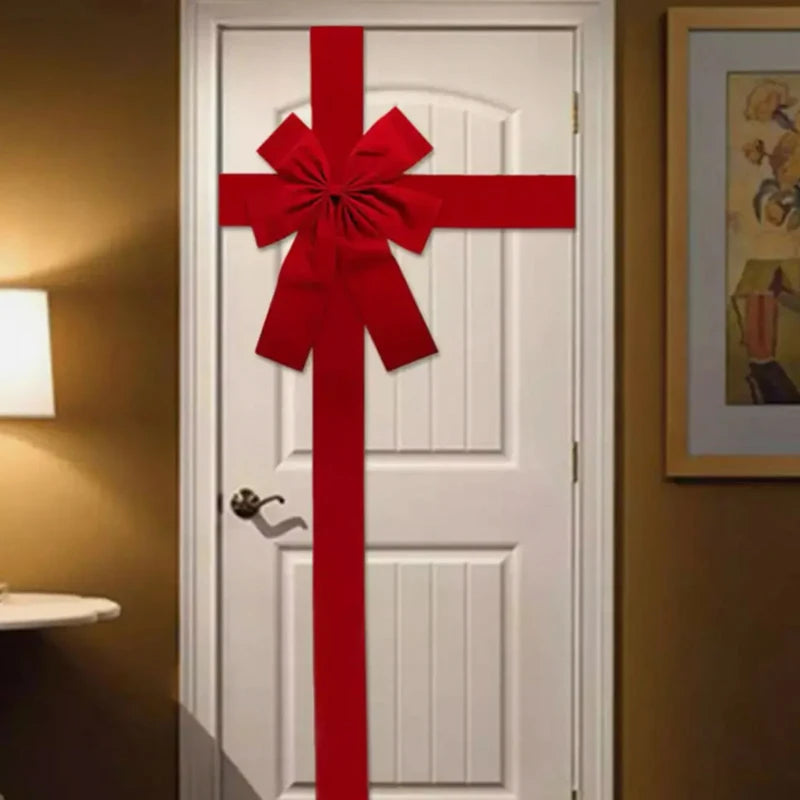 Large Red Organza Front Door Bow beautifully displayed on a white door for festive decoration