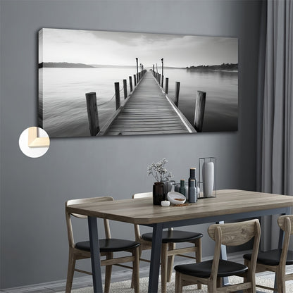 Large vintage bridge canvas art depicting a serene lakeside pier in black and white