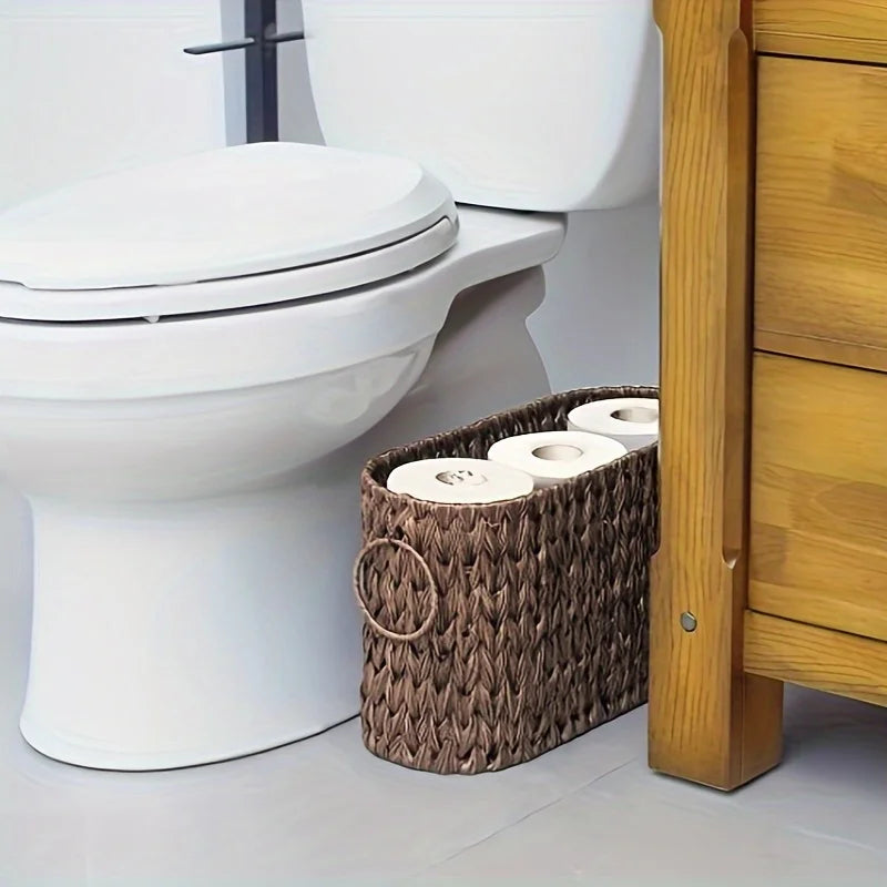 Nutshell toilet paper holder basket featuring a woven design, perfect for organizing bathroom essentials