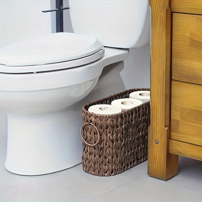 Nutshell toilet paper holder basket featuring a woven design, perfect for organizing bathroom essentials