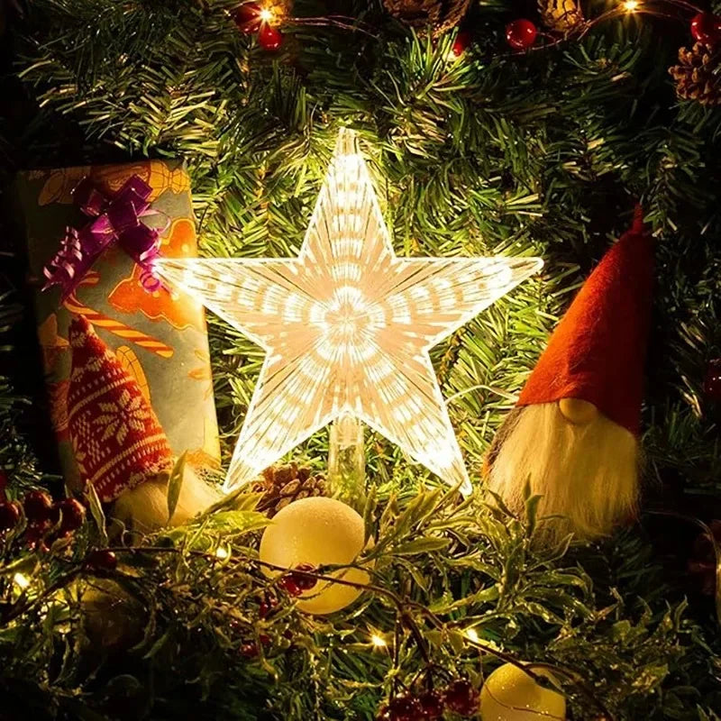 LED Christmas tree star topper glowing brightly on a decorated tree with gifts and ornaments