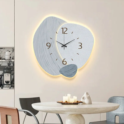 Nutshell LED wall clock for living room with modern design and soft glowing light feature