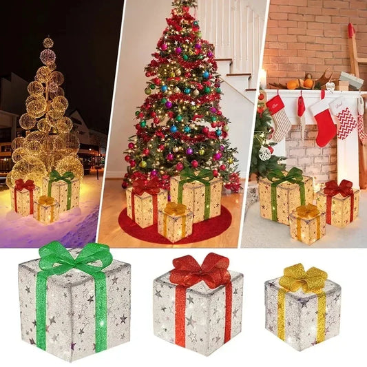 Colorful lighted Christmas gift box set with sparkling decorations for festive holiday décor