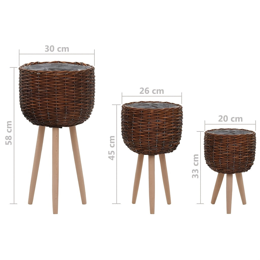 Set of three wooden leg lined plater baskets in various heights for stylish plant display