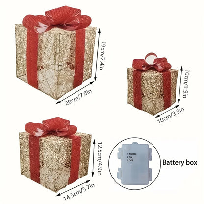 Luminous Christmas gift box decorations in gold with red ribbons and battery box for festive displays