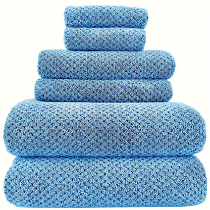 Nutshell luxury bath towel set in soft blue, featuring multiple sizes for versatile bathroom use