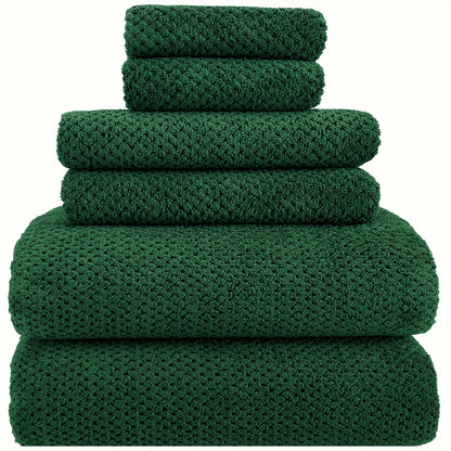 Nutshell luxury bath towel set in deep green, featuring multiple sizes for a complete bathroom experience