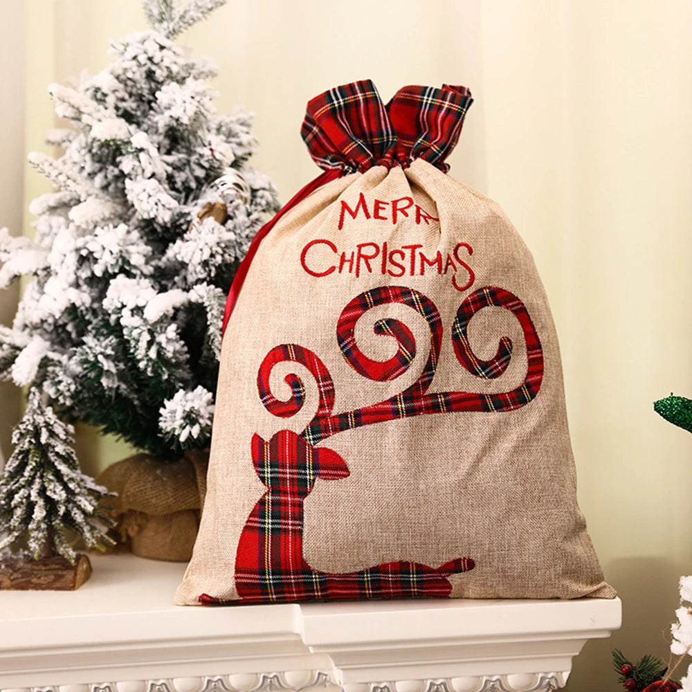 Luxury linen Christmas gift sack featuring a festive design with a Merry Christmas greeting