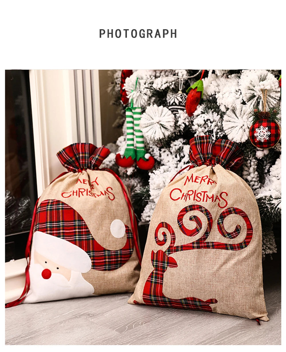 Two luxury linen Christmas gift sacks with festive designs featuring Santa and a playful cat