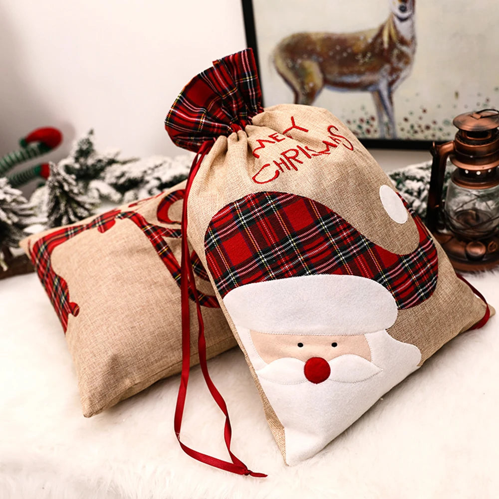 Luxury linen Christmas gift sack featuring festive Santa design and plaid accents for holiday gifting