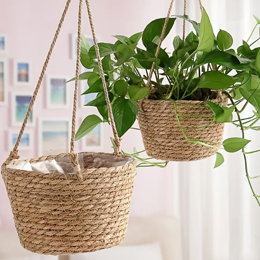 Nutshell macrame hanging planter with woven design and green plants for home decor