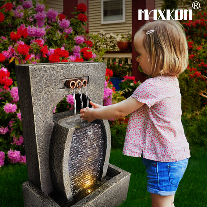 Child enjoying a solar waterfall fountain with a decorative stone design in a colorful garden