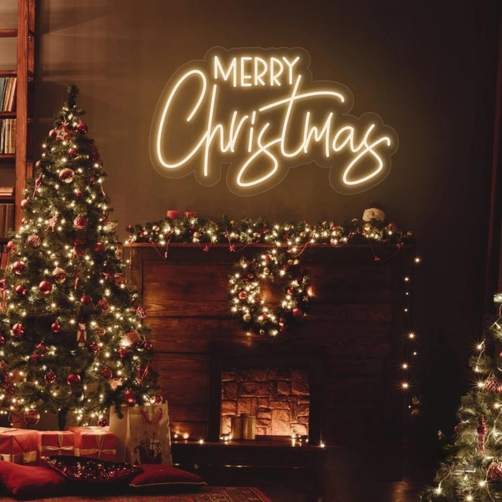 Merry Christmas neon sign glowing above a decorated Christmas tree and fireplace