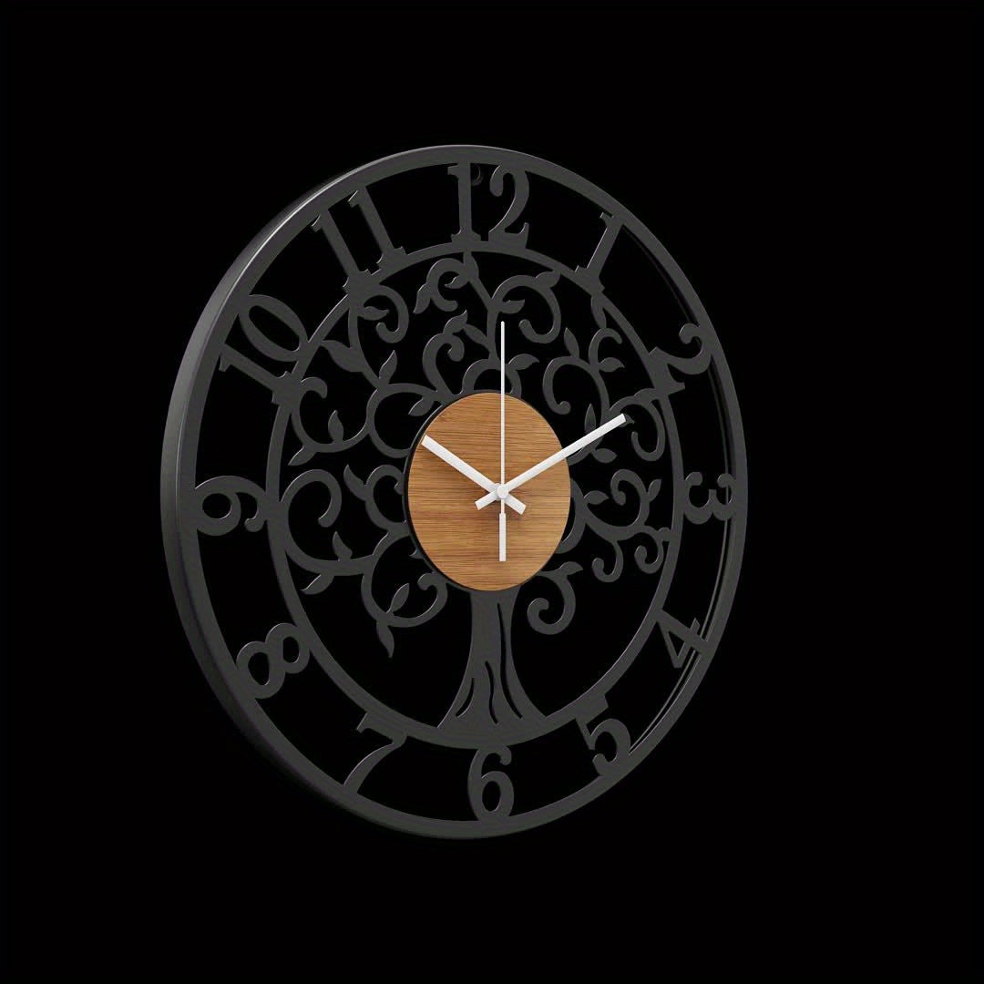 Nutshell metallic black frame clock featuring a decorative tree design and wooden center