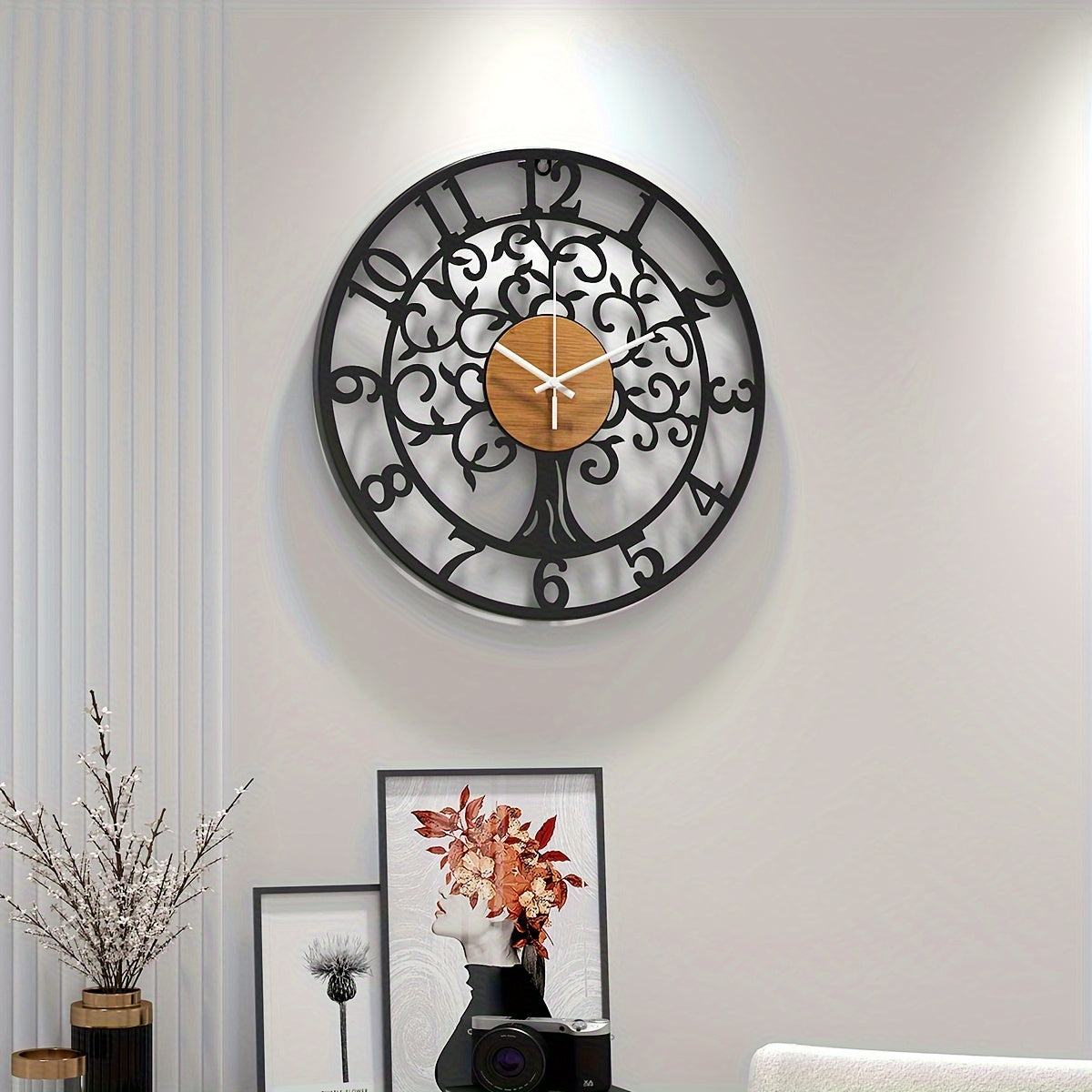 Nutshell metallic black frame clock with a unique tree design and wooden clock face