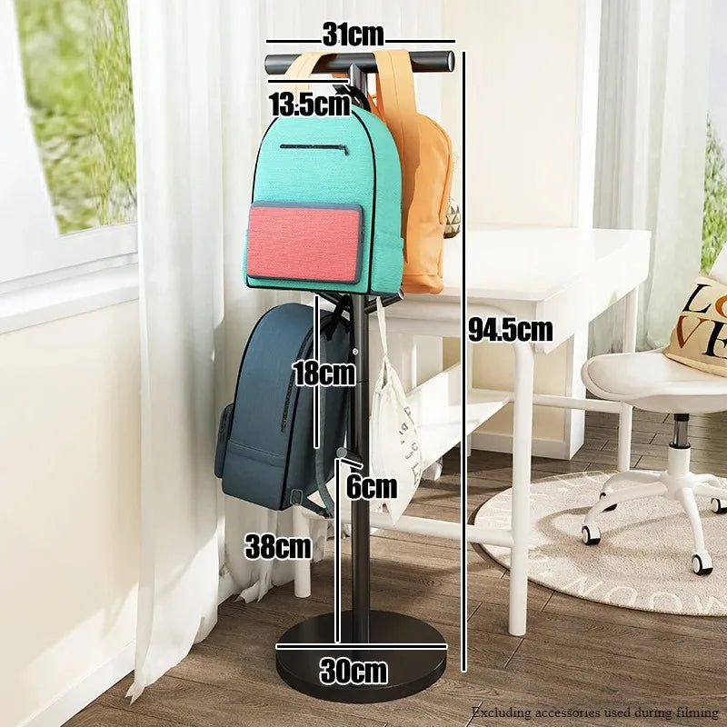 Nutshell coat stand holding multiple backpacks near desk School Bag Storage Rack for entryway