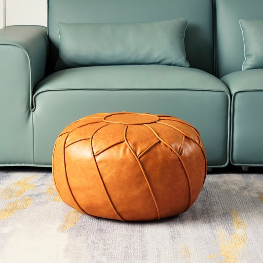 Nutshell modern faux leather pouf in orange color, perfect for stylish and functional living room decor