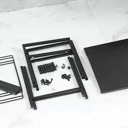 Modern laundry hamper with shelf components neatly arranged, ready for assembly on a marble surface.
