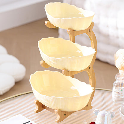 Nutshell multi-layer fruit tray set - drop resistant with three elegant yellow bowls on a stylish stand