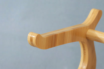 Close-up of wooden fruit bowl part from Nutshell Multi-Tier Serving Stand in natural bamboo finish
