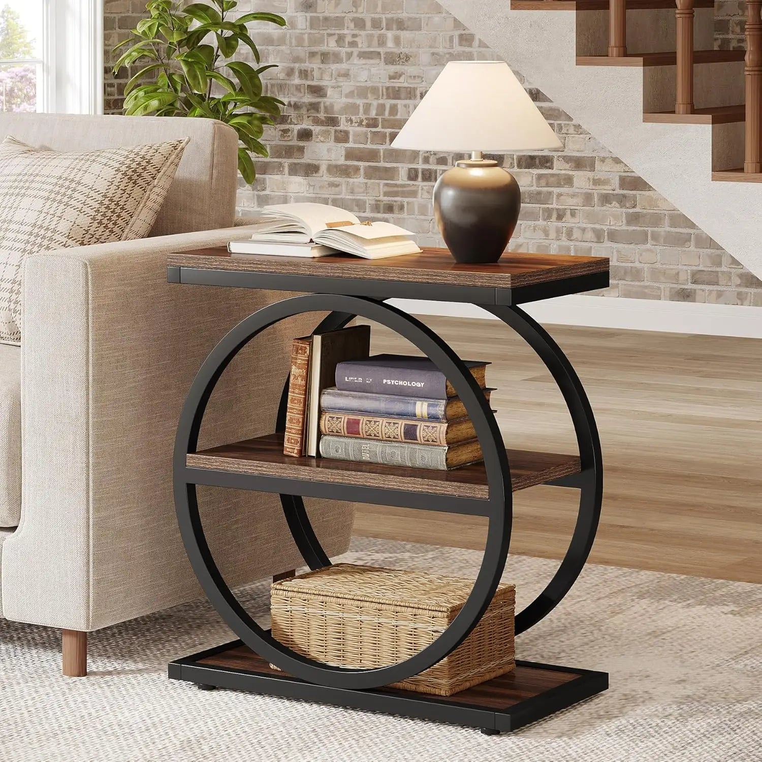 Nutshell narrow end table with storage featuring a circular design and shelves for books and decor