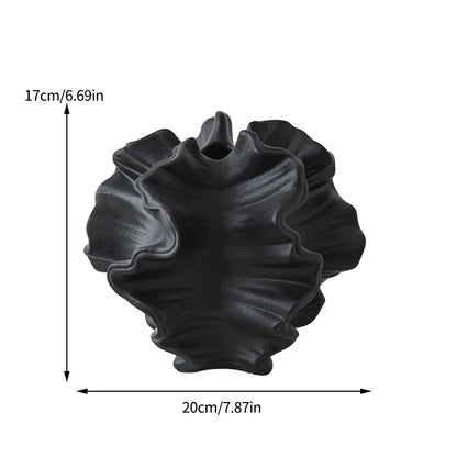 Nutshell black Nordic art coral vase with wavy design measuring 20cm by 17cm