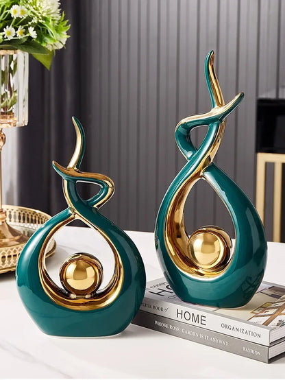 Nutshell vases with green and gold finish shaped as Nordic home decor figurines on a table