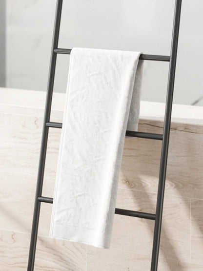 Nordic Style Towel Rack Ladder Featuring a White Towel Hanging on a Modern Design