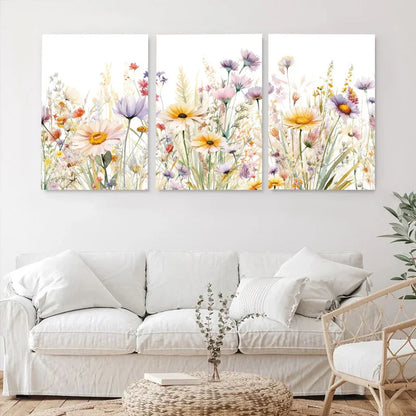 Nordic wildflower wall art featuring colorful floral designs in three panels above a cozy couch