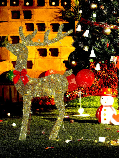 Nutshell outdoor Christmas deer decorations illuminated with lights and festive accents for holiday cheer