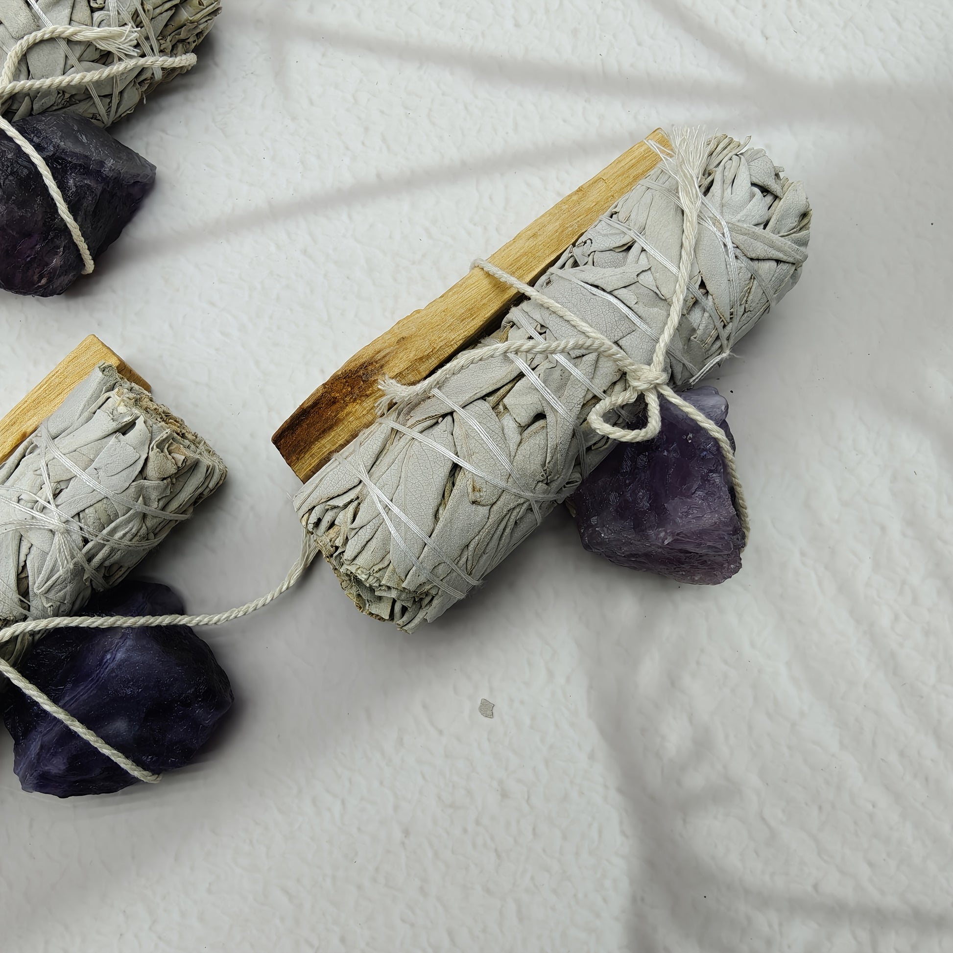 Nutshell Palo Santo White Sage Crystal set with bundled sage and amethyst crystals for cleansing rituals