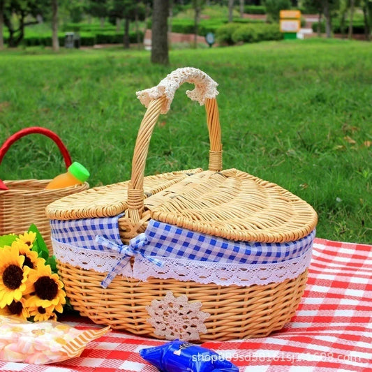 Nutshell Picnic Basket with Lid featuring a blue checkered design and wicker handle for outdoor gatherings