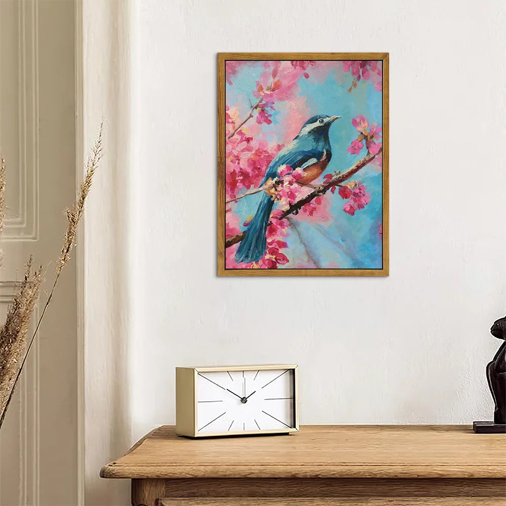 Pink bird decorative wall art featuring a vibrant blue bird perched on a cherry blossom branch