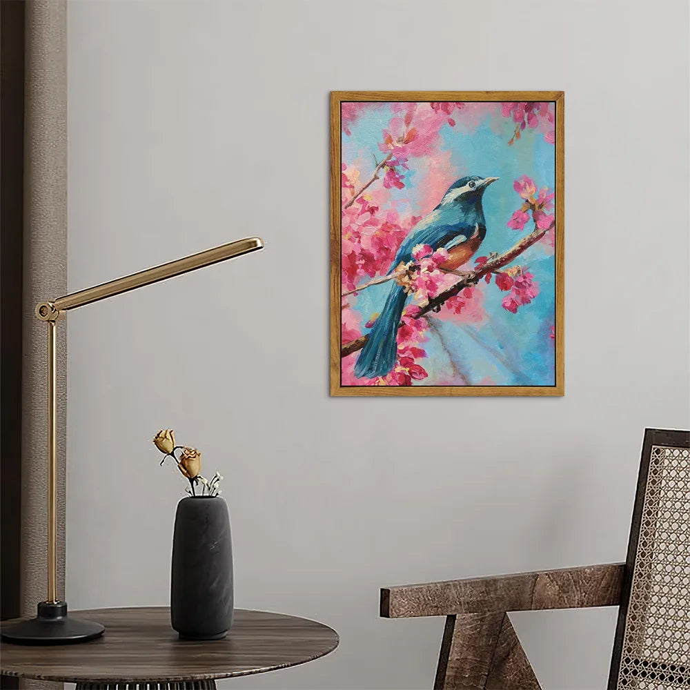 Pink bird decorative wall art featuring a blue bird perched on a cherry blossom branch