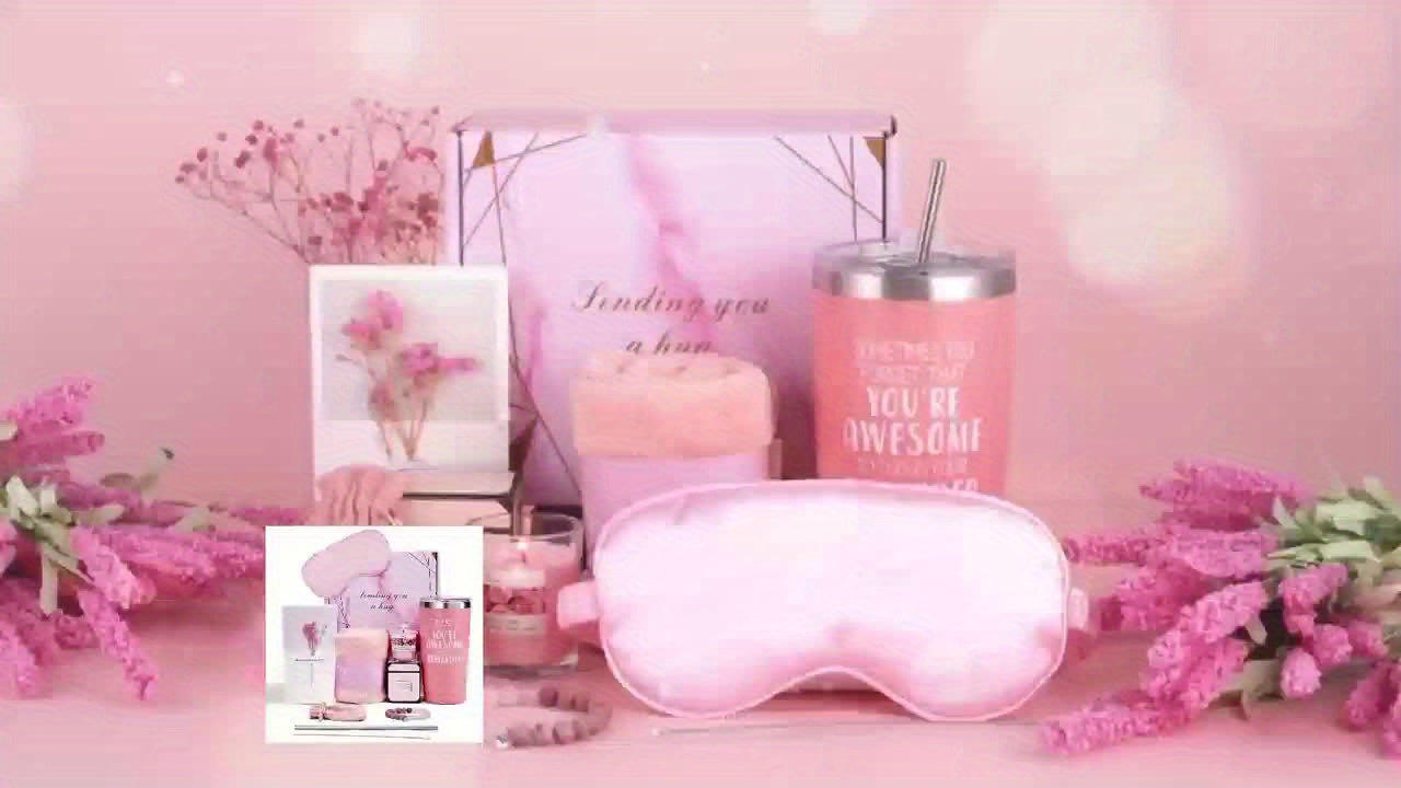 Pink Relaxation Gift Set With Travel Mug featuring an eye mask, candles, and floral accents