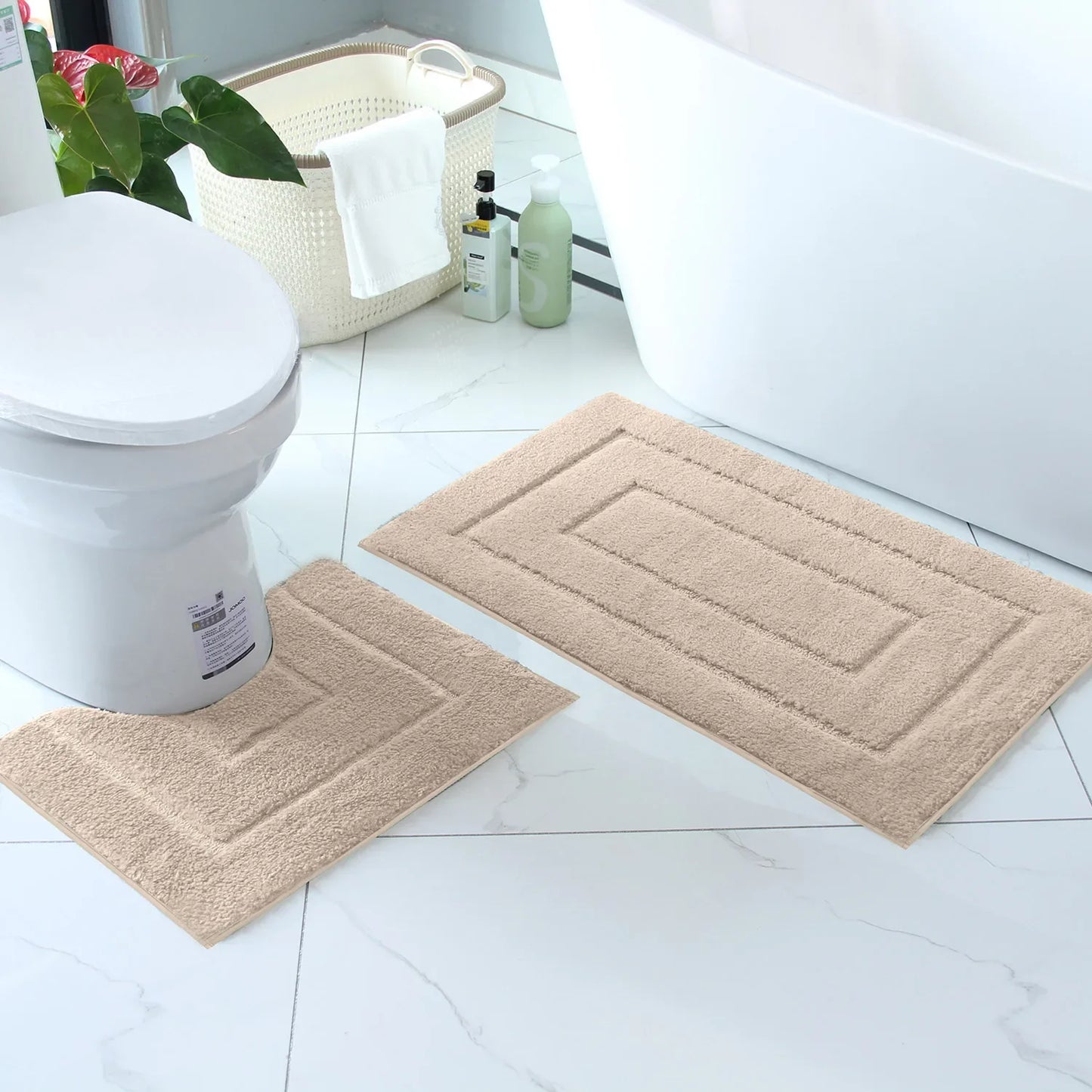 Nutshell plush bathroom floor mat set in beige with soft texture for added comfort and style