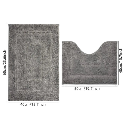 Nutshell plush bathroom floor mat set in gray with rectangular and contoured shapes for comfort and style